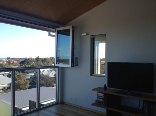 Steep block and plenty of windows for wonderful views, light and air, great indoor/outdoor feel