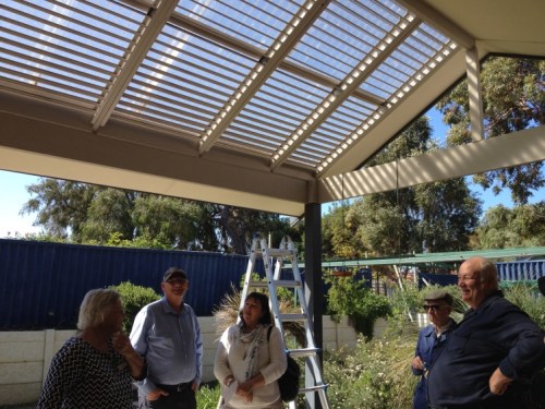 Solar pergola has slats fixed at 35degrees for winter sun but summer shade Alsinite over the pergola provides light but shelter from rain