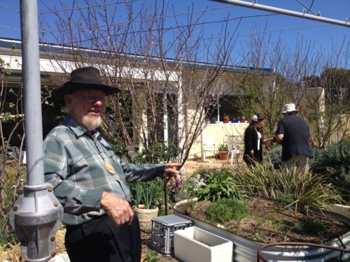 Sunny in his garden with his ‘vertical axis horizontally rotating solar clothes dryer’ yes a good old hills hoist ;)
