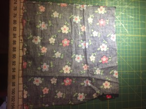 Using straight stitch, sew along the bottom and left hand side of the bag.
